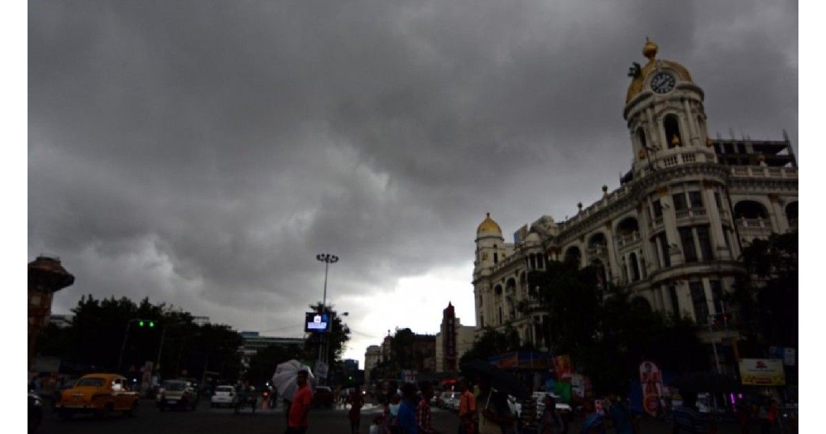 Dark thunderstorm clouds over Kolkata skyline with lightning and gusty winds as rain approaches, representing West Bengal weather update and Kalbaisakhi storm conditions