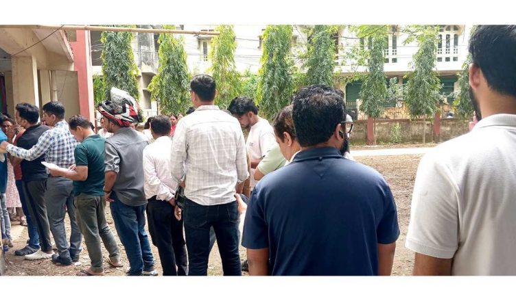 Voters standing in queues at polling stations during Assam Assembly Elections 2026 as turnout reaches nearly 39 percent by 11 AM