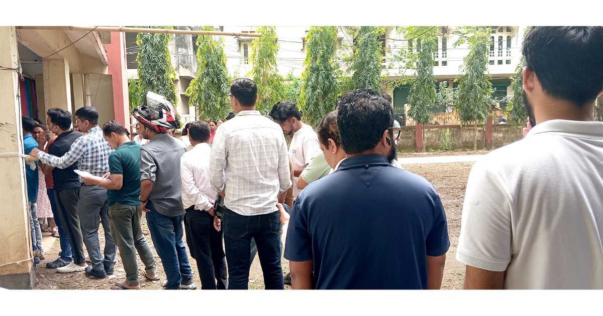 Voters standing in queues at polling stations during Assam Assembly Elections 2026 as turnout reaches nearly 39 percent by 11 AM