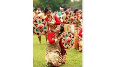 People celebrating Rongali Bihu in Assam with traditional dance, music, and Goru Bihu cattle rituals