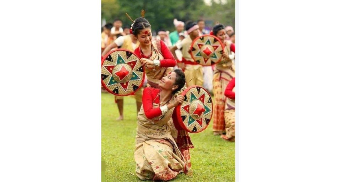 People celebrating Rongali Bihu in Assam with traditional dance, music, and Goru Bihu cattle rituals