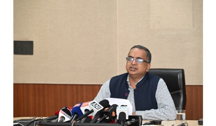 Assam voters standing in line at polling station during assembly elections
