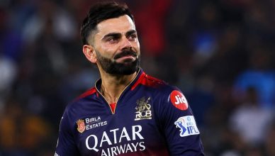 “Virat Kohli showing an emotional reaction during an IPL match as fans cheer in the stadium”
