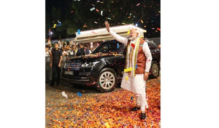 BJP workers celebrate early election leads in West Bengal and Assam as PM Narendra Modi prepares to address party headquarters in New Delhi