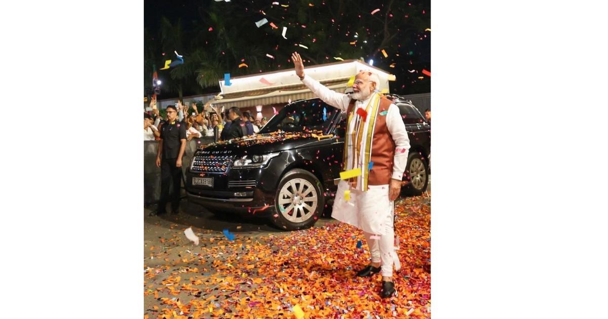 BJP workers celebrate early election leads in West Bengal and Assam as PM Narendra Modi prepares to address party headquarters in New Delhi