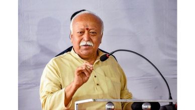 “Mohan Bhagwat arriving in Assam for RSS training camp visit in Hojai with volunteers gathered at the programme venue”